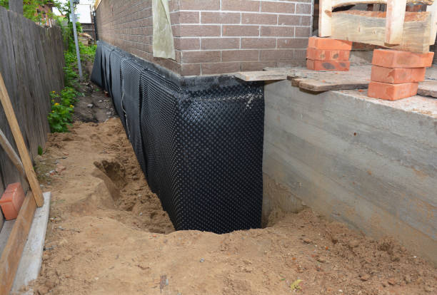 Happy homeowners after waterproofing job in South Pittsburg